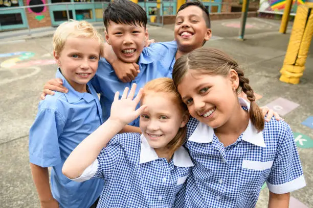 A teacher exemplifying one of the 10 essential classroom management skills as her class is focused and organised.