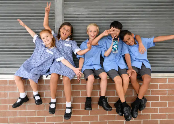 A teacher exemplifying one of the 10 essential classroom management skills as her class is focused and organised.