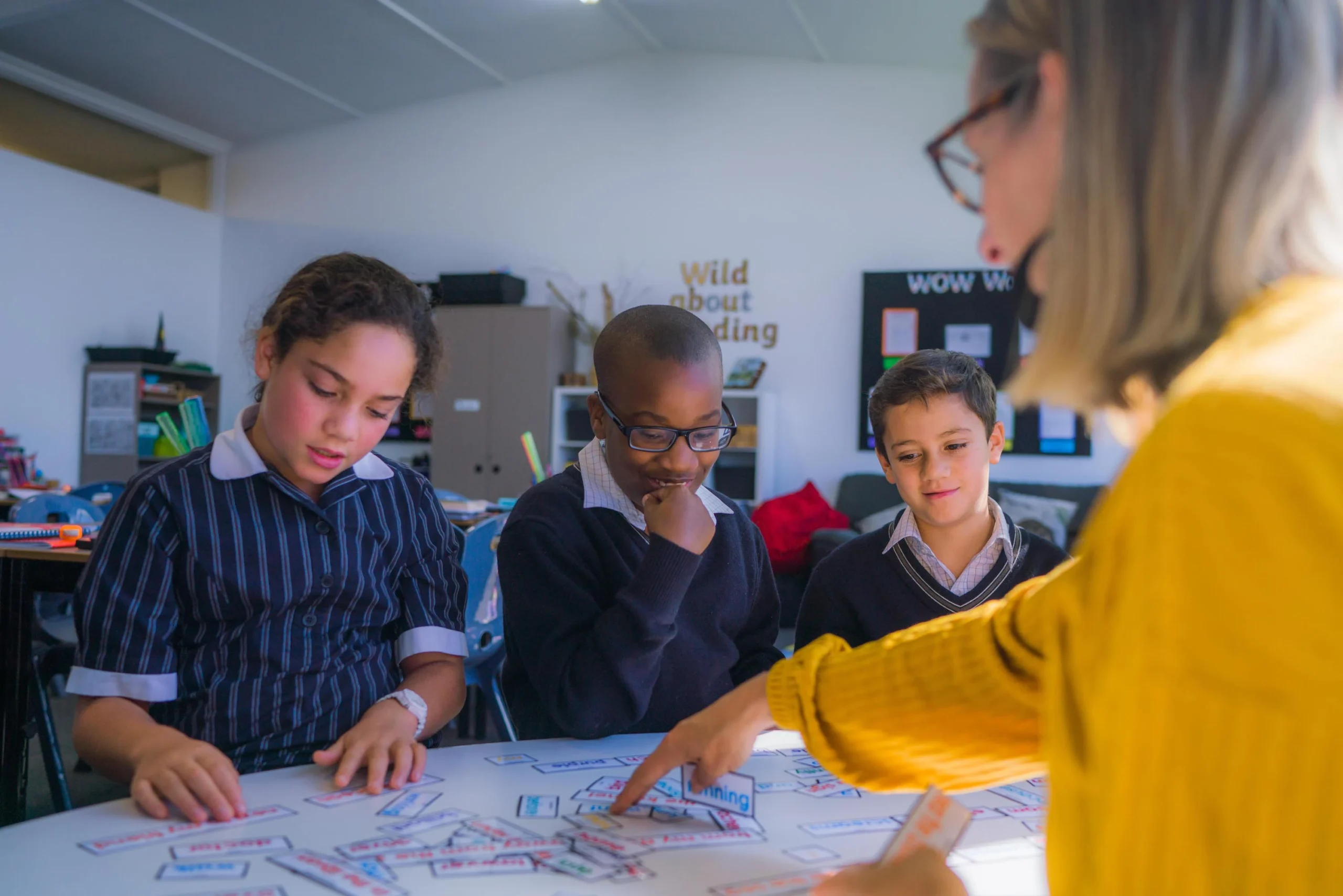 A teacher exemplifying one of the 10 essential classroom management skills as her class is focused and organised.